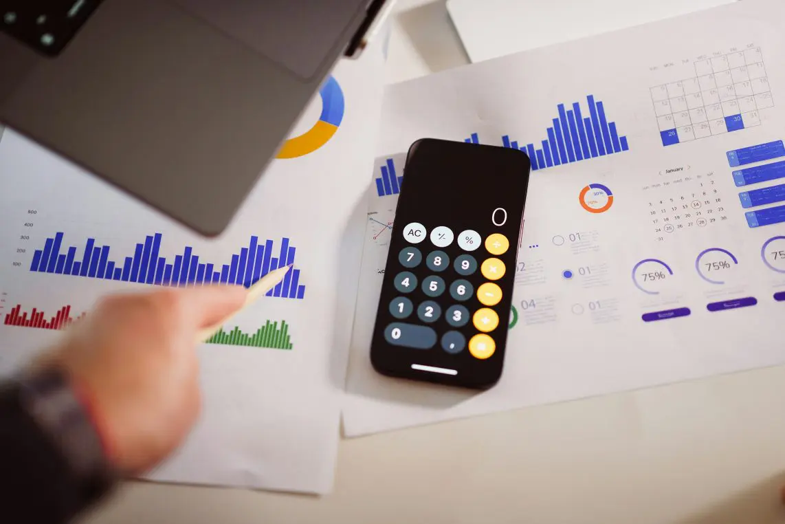 Smartphone with calculator app (displaying 