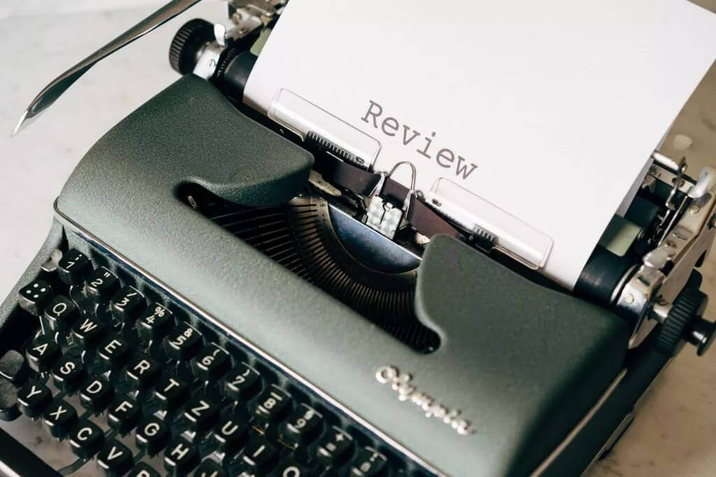 The word review written on some paper in a typewriter