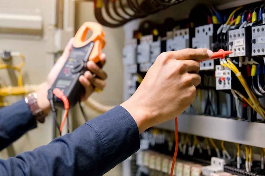 A person working on an electrical installation