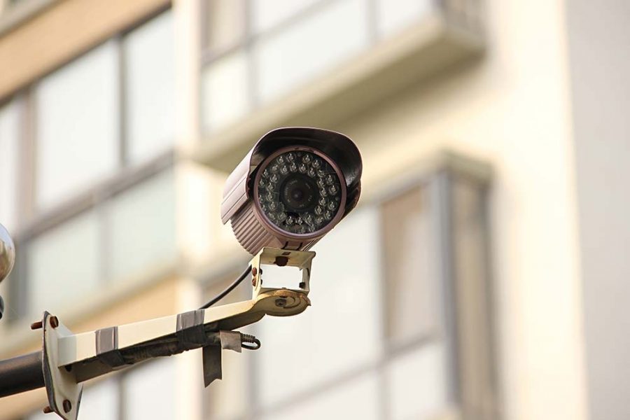 A security camera attached to a metal fixing